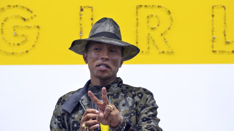 Pharrell Williams à l'inauguration de son exposition "GIRL", à Paris, le 26 mai 2014.