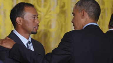 Le champion de golf Tiger Woods et Barack Obama, alors président des Etats-Unis en 2014 à la Maison Blanche.