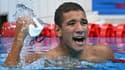 Le Tunisien Ahmed Hafnaoui exulte après sa victoire finale du 400 m libre, à Tokyo, le 25 juillet 2021