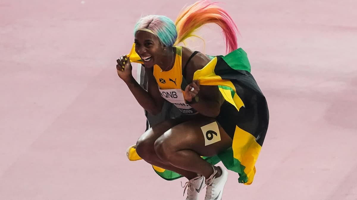 Shelly-Ann Fraser-Pryce après sa victoire en finale du 100 mètres féminin des Mondiaux de Doha