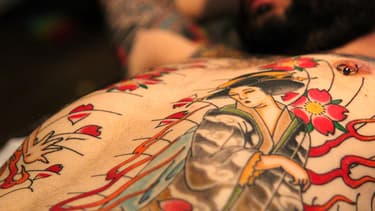 Au salon du tatouage, en mars 2014.
