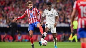 Antoine Griezmann et Aurélien Tchouameni lors d'un match Atlético-Real, à Madrid le 29 septembre 2024
