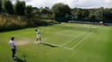Carlos Alcaraz à l'entraînement sur les courts de Wimbledon