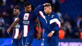 Presnel Kimpembe en discussion avec Kylian Mbappé