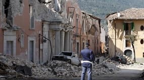 Six scientifiques et un responsable gouvernemental italiens ont été condamnés à six ans de prison lundi pour négligence dans leur évaluation des risques naturels pesant sur la ville de L'Aquila, frappée par un séisme meurtrier le 6 avril 2009. /Photo d'ar