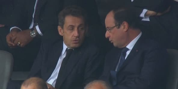 François Hollande et Nicolas Sarkozy, le 10 décembre au Soccer City Stadium de Soweto. François Hollande et Nicolas Sarkozy, le 10 décembre au Soccer City Stadium de Soweto.