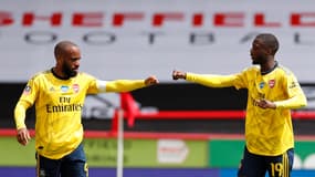 Alexandre Lacazette (à gauche) et Nicolas Pépé