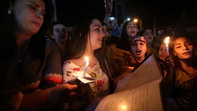 Célébration des chrétiens à Erbil de l'avancée des forces de la coalition à Qaraqosh.