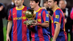 Andrés Iniesta, Lionel Messi et Xavi