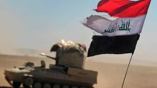 Les forces irakiennes progressent vers le village de Sheikh Younis le 19 février 2017 au sud de Mossoul Les forces irakiennes progressent vers le village de Sheikh Younis le 19 février 2017 au sud de Mossoul