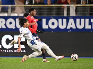 Clément Akpa et Jonathan David lors d'Auxerre-Lille, 10 janvier 2025