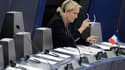 Marine Le Pen, présidente du Front national et députée européenne, assiste à un débat au Parlement européen à Strasbourg, le 26 octobre 2016