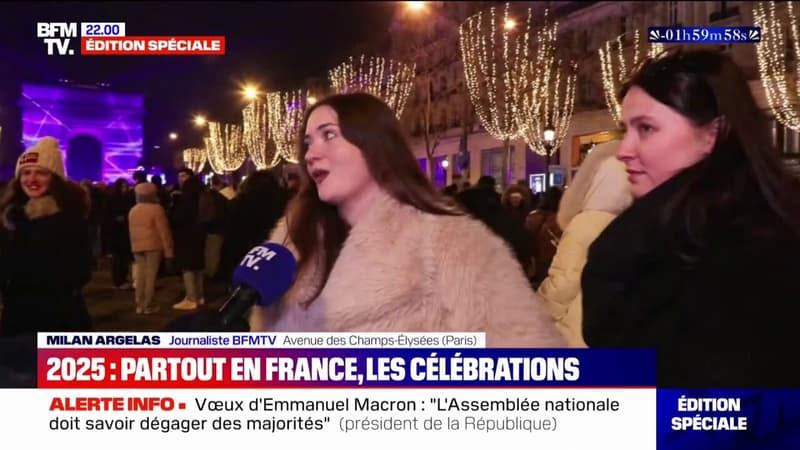 Nouvel an: sur les Champs-Élysées à Paris l'ambiance se réchauffe à l'approche du feu d'artifice