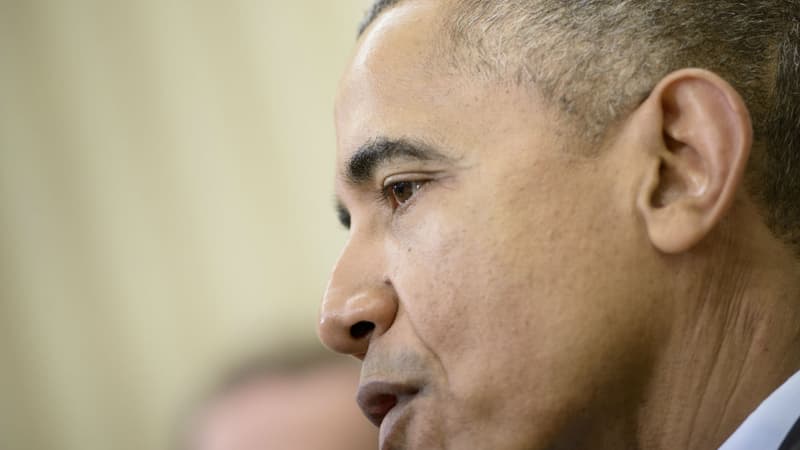 Barack Obama lors d'une conférence de presse dans le bureau ovale de la Maison Blanche