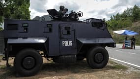 La police renforce ses contrôles à la frontière entre la Malaisie et la Thaïlande, après la découverte de 139 fosses.