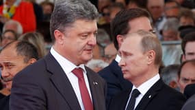 Depuis le début de la crise ukrainienne, les rencontres entre Petro Porochenko et Vladimir Poutine sont très rares. Leur entrevue, immortalisée sur cette photo lors des commémorations du 70e anniversaire du Débarquement, le 6 juin dernier, avait été particulièrement remarquée.