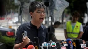 Joshua Wong face à la presse, le 2 juillet 2019, devant le siège du gouvernement de Honk Kong.