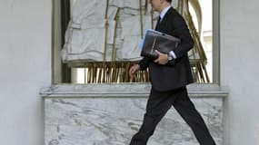 Le ministre de l'Economie Pierre Moscovici a annoncé le poids des prélèvements obligatoires augmenterait en 2014 d'environ six milliards d'euros. /Photo prise le 10 avril 2013/REUTERS/Philippe Wojazer