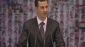 Lors d'un discours d'environ une heure dans une salle d'opéra au centre de Damas , le président syrien Bachar al Assad a appelé dimanche ses compatriotes à la "guerre pour défendre la nation", en qualifiant les insurgés de terroristes manipulés par les pu