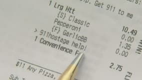 Elle avait écrit dans sa commande de pizza: "S'il vous plaît, aidez-moi! Envoyez-moi le 911".