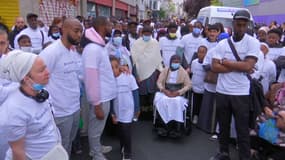 Plusieurs centaines de personnes participent à Paris le 4 mai, à une "marche blanche" en mémoire des deux hommes tués par un policier alors qu'ils auraient forcé un contrôle la semaine dernière sur le Pont-Neuf.