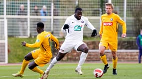 Makan Traoré (ici au centre, en novembre 2021)