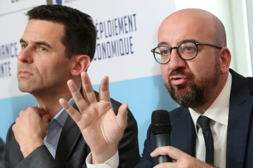 Jean-Marc Nollet (g), coprésident du parti wallon Ecolo, et Charles Michel, Premier ministre de la Belgique, lors d'un débat, le 29 avril 2019 à Namur Jean-Marc Nollet (g), coprésident du parti wallon Ecolo, et Charles Michel, Premier ministre de la Belgique, lors d'un débat, le 29 avril 2019 à Namur