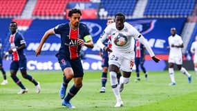 Marquinhos et Timothy Weah au duel lors de PSG-Losc, au Parc des Princes le 3 avril 2021