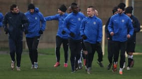 Les joueurs de Granville à l'entraînement sous la pluie