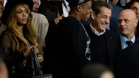 Beyonce, Jay-Z et Nicolas Sarkozy lors du match PSG-FC Barcelone, au Parc des Princes.