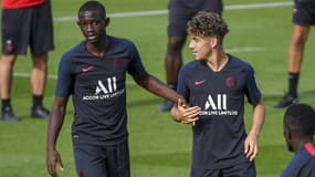 Tanguy Kouassi, à gauche