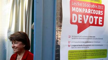 Martine Aubry a reconnu dimanche soir sa défaite au second tour de la primaire socialiste face à François Hollande, avec lequel elle a promis de travailler pour faire gagner la gauche à la présidentielle de 2012. /Photo prise le 16 octobre 2011/REUTERS/Pa