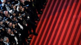 Des photographes massés pour la montée des marches au Festival de Cannes le 21 mai 2019 