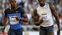 L'ex-détenteur du record du monde du 100m, Asafa Powell (g), un temps retiré de la liste des engagés aux Mondiaux d'athlétisme en raison d'un différent avec sa fédération, a été finalement réintégré après intervention de l'IAAF.