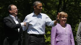 François Hollande, Barack Obama et Angela Merkel samedi lors du sommet du G8 de Camp David. Marine Le Pen a estimé dimanche sur France 3 que le président français, qui s'est félicité d'avoir imposé le mot-clé de "croissance" à son premier G8, ne menait qu