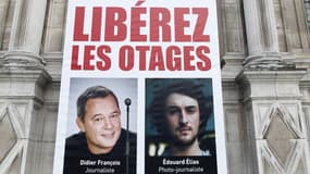 Portrait des journalistes Didier François et Edouard Elias à Paris le 6 septembre 2013.