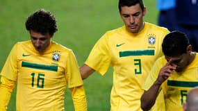 Elano et Lucio abattus