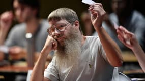 Le Néo-Zélandais Nigel Richards participe à une catégorie des championnats du monde de Scrabble francophone à Louvain-La-Neuve, le 21 juillet 2015.