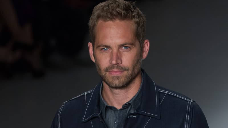 Paul Walker, lors d'un défilé le 21 mars 2013.