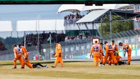 Des activistes pénétrant sur la piste du Grand Prix de Grande-Bretagne, 3 juillet 2022