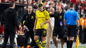 Thomas Meunier sort blessé lors du match amical Dortmund-Manchester United (2-3), le 30 juillet 2023