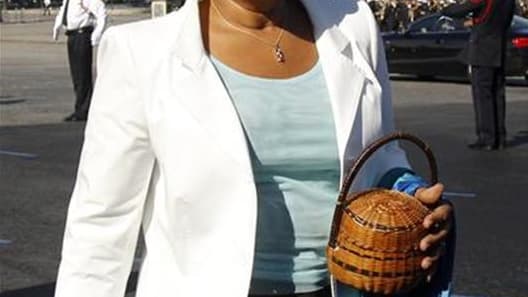 La ministre de la Justice Christiane Taubira a quitté samedi matin l'hôpital proche de Bordeaux où elle avait été admise la veille pour des examens à la suite d'un malaise. /Photo prise le 14 juillet 2012/REUTERS/Benoît Tessier