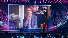 Un écran géant diffuse un message enregistré de la chanteuse canadienne Céline Dion lors de la répétition générale de la finale du Concours Eurovision de la chanson 2025 à la St. Jakobshalle de Bâle, le 16 mai 2025.