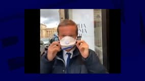 Nicolas Dupont-Aignan et son masque 
