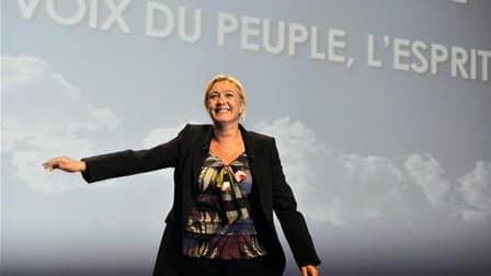 Marine Le Pen a présenté jeudi son équipe de campagne pour la présidentielle de 2012, dont un haut fonctionnaire censé incarner à la fois la compétence et le rassemblement qu'elle appelle de ses voeux. /Photo prise le 11 septembre 2011/REUTERS/Jean-Pierre