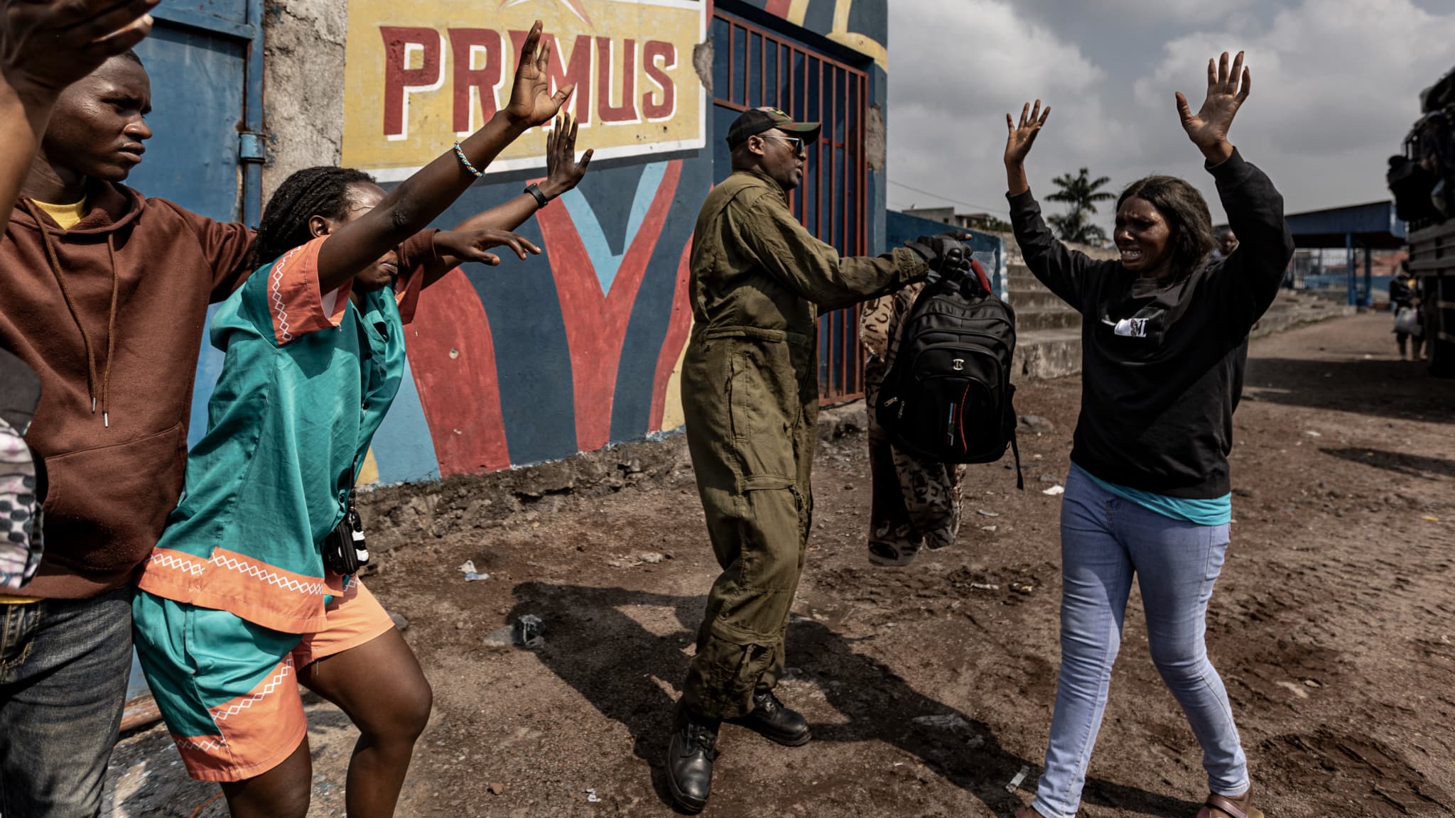 A woman from Bukavu says goodbye to her loved ones during a recruitment of civilians, police officers and former members of the Armed Forces of the Democratic Republic of Congo (FARDC) who have reportedly decided to voluntarily join the M23 movement in Goma, DRC, February 23, 2025.