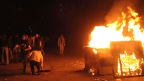 Affrontements place Tahrir, au Caire. Deux personnes ont été tuées et plusieurs centaines d'autres blessées samedi en Egypte, au Caire et à Alexandrie, lors d'affrontements qui ont éclaté entre forces de l'ordre et manifestants venus réclamer un transfert