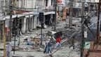 A Talcahuano. Quelque 279 corps ont été identifiés depuis le violent séisme de samedi au Chili. Le gouvernement a annoncé par ailleurs qu'un deuil national de trois jours serait observé à partir de dimanche. /Photo prise le 4 mars 2010/REUTERS/Mariana Baz