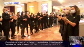 Des applaudissements retentissent à l'ouverture des Galeries Lafayette à Paris ce samedi