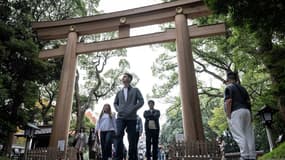 Un torii (portail) du sanctuaire de Meiji à Tokyo, le 14 novembre 2024